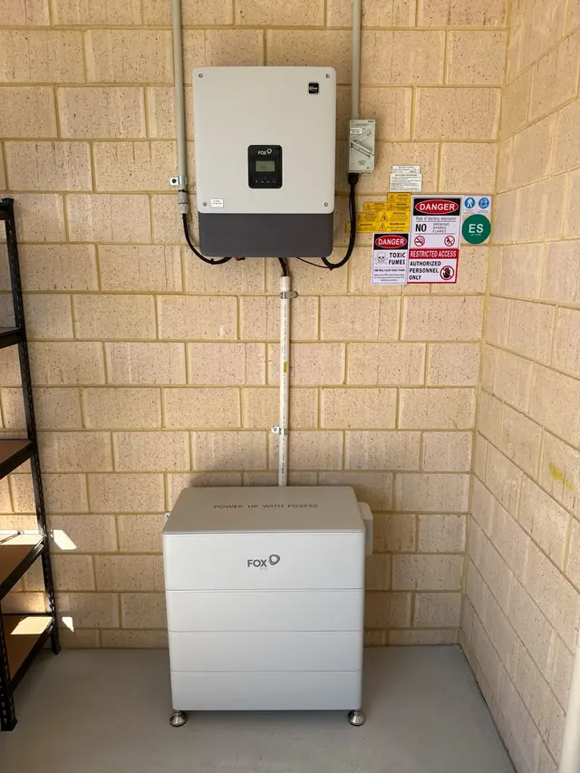 Fox ESS battery and inverter installed in a garage