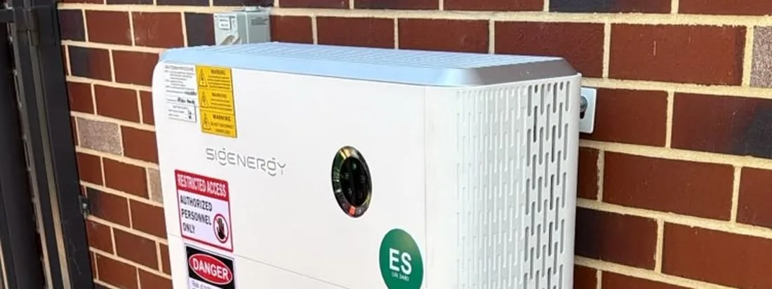 Sigenergy battery system installed against a red brick wall by RZ Solar & Battery